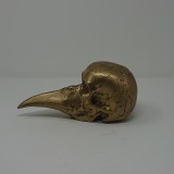 BRONZE SKULL WITH BEAM